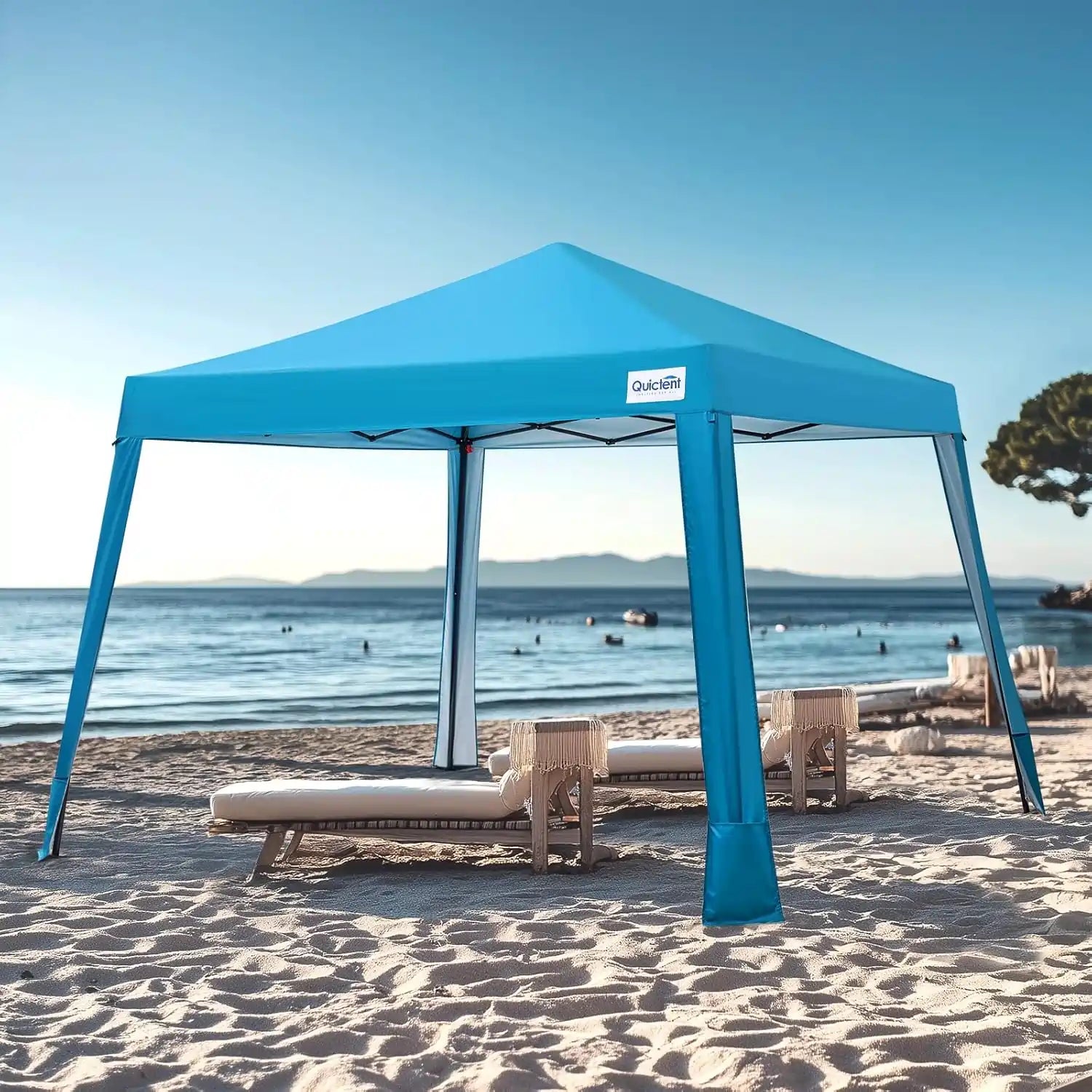 Blue pop-up canopy tent on a sandy beach#color_Blue